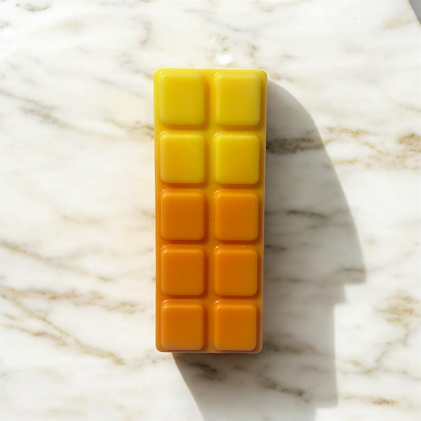 Hunny wax melt snap bar with sweet honey, vanilla, and soft floral notes.