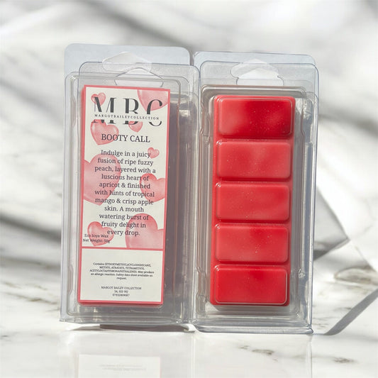 Red wax melts in a clear packaging with a label on a white background called booty call